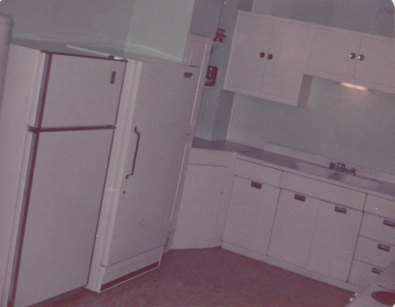 1974-12-02 - Monday - white kitchen, piano with pictures, curtains, bed, no date on these 5pics but probably on or after this date, 5pic-4.png