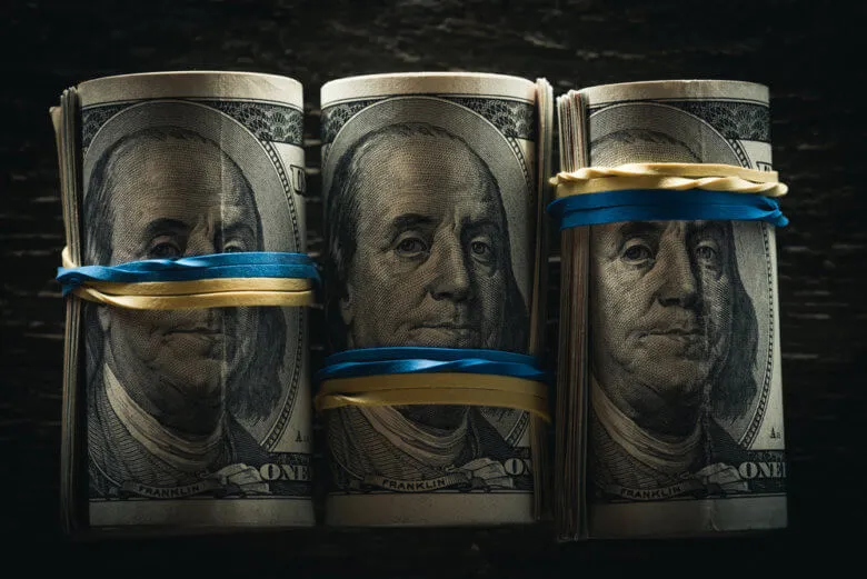 real-value-of-money-rolled-up-bills-1-780x521.jpg