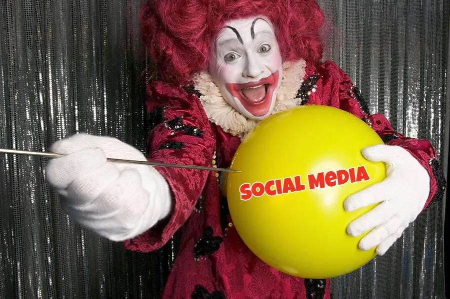bigstock-Clown-about-to-pop-a-balloon-17521505-1.jpg