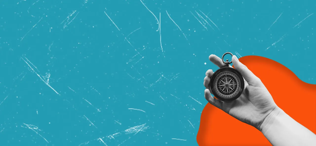 compass-hand-man-business-development-different-directions.jpg