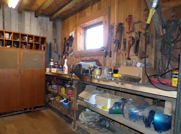 Cleaning the barn - workbench clean and ready to sort crop April 2023.jpg