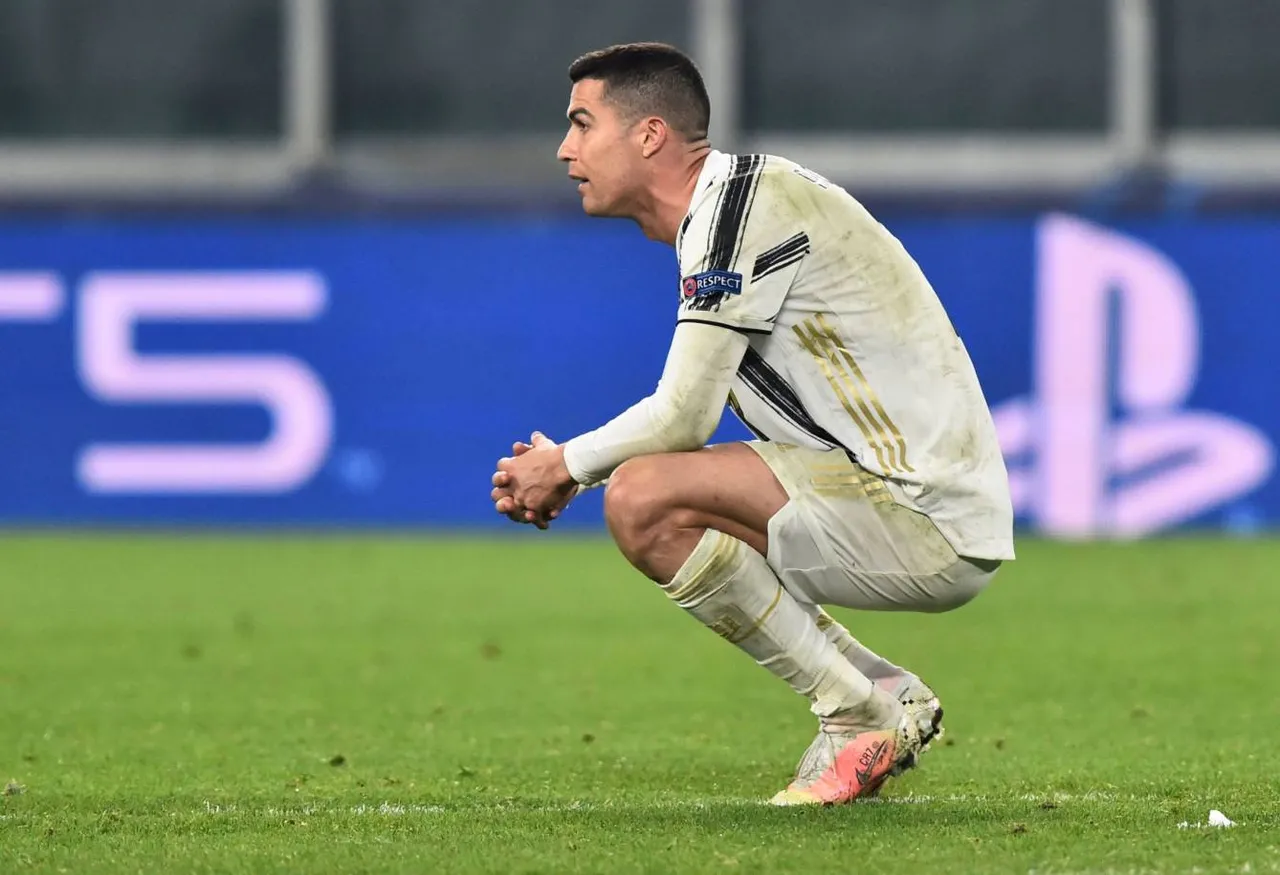 soccer-football-champions-league-round-of-16-second-leg-juventus-v-fc-porto-allianz-stadium-turin-italy-march-9-2021-juventus-cristiano-ronaldo-looks-dejected-after-fc-porto-s-sergio-oliveira-scored-their-second-goal-re.jpg