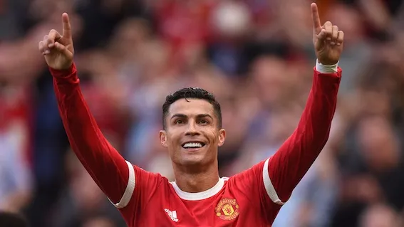 FILE-Manchester-United-s-Portuguese-striker-Cristiano-Ronaldo-celebrates-after-scoring-their-second-goal-during-their-English-Premier-League-football-match-against-Newcastle-at-Old-Trafford-in-Manchester-on-September-11-2021-Photo-Oli-Scarff-AFP copy.jpg