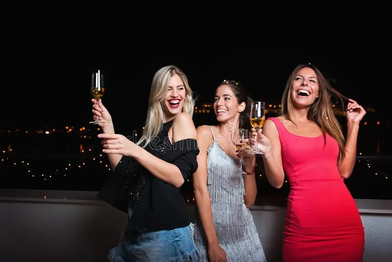 three-beautiful-cheerful-women-having-girls-night-out-fun-happy-smiling-107748902.jpg