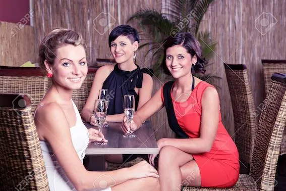 19135720-group-of-young-women-in-the-bar.jpg