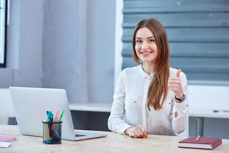 girl-office-worker-sitting-headphones-smiling-showing-thumb-up-happy-young-desk-laptop-wearing-gesture-106665747.jpg