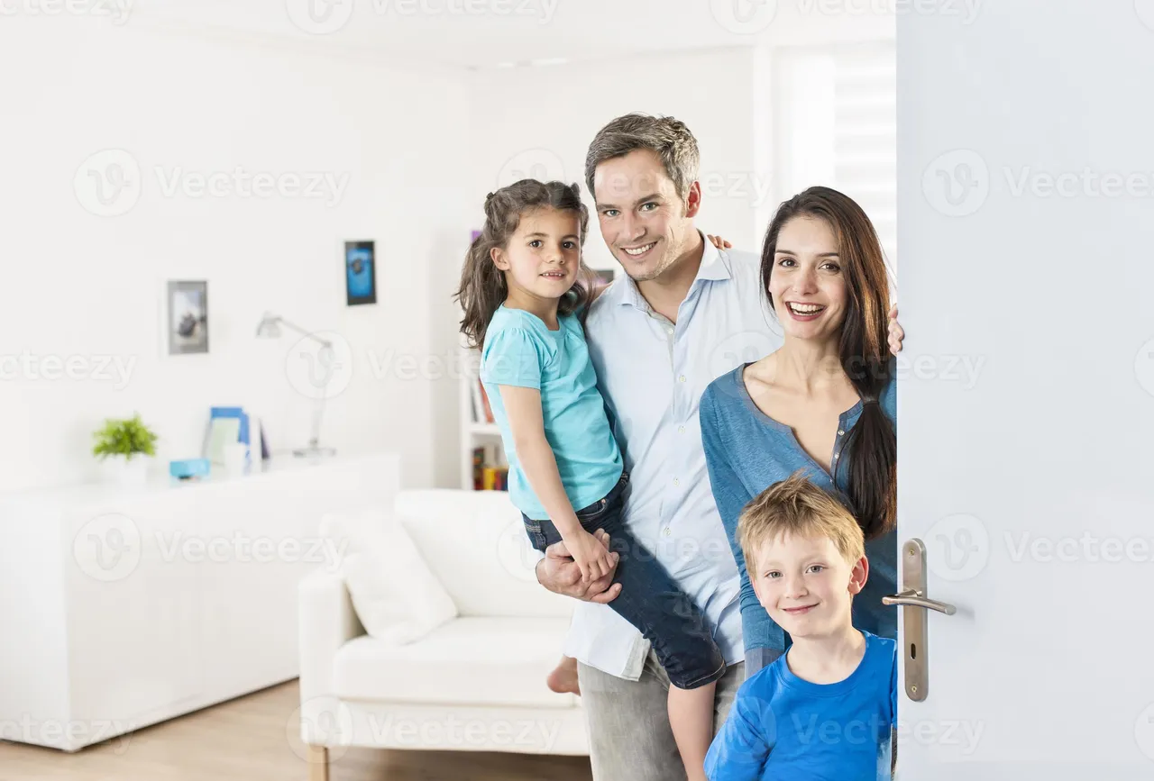 family-standing-at-front-door-to-invite-people-home-photo.jpg