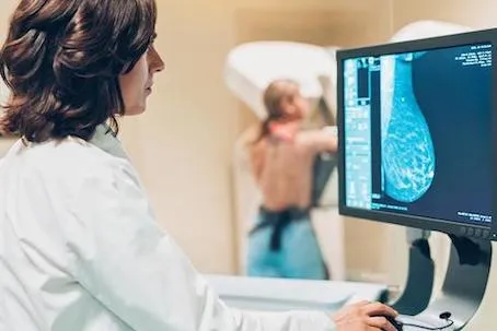 a-doctor-looking-at-results-from-a-3d-mammogram.jpg