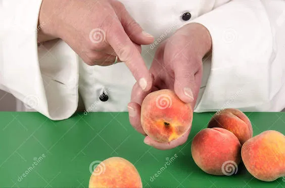 female-chef-shows-her-index-finger-peach-26951353.jpg