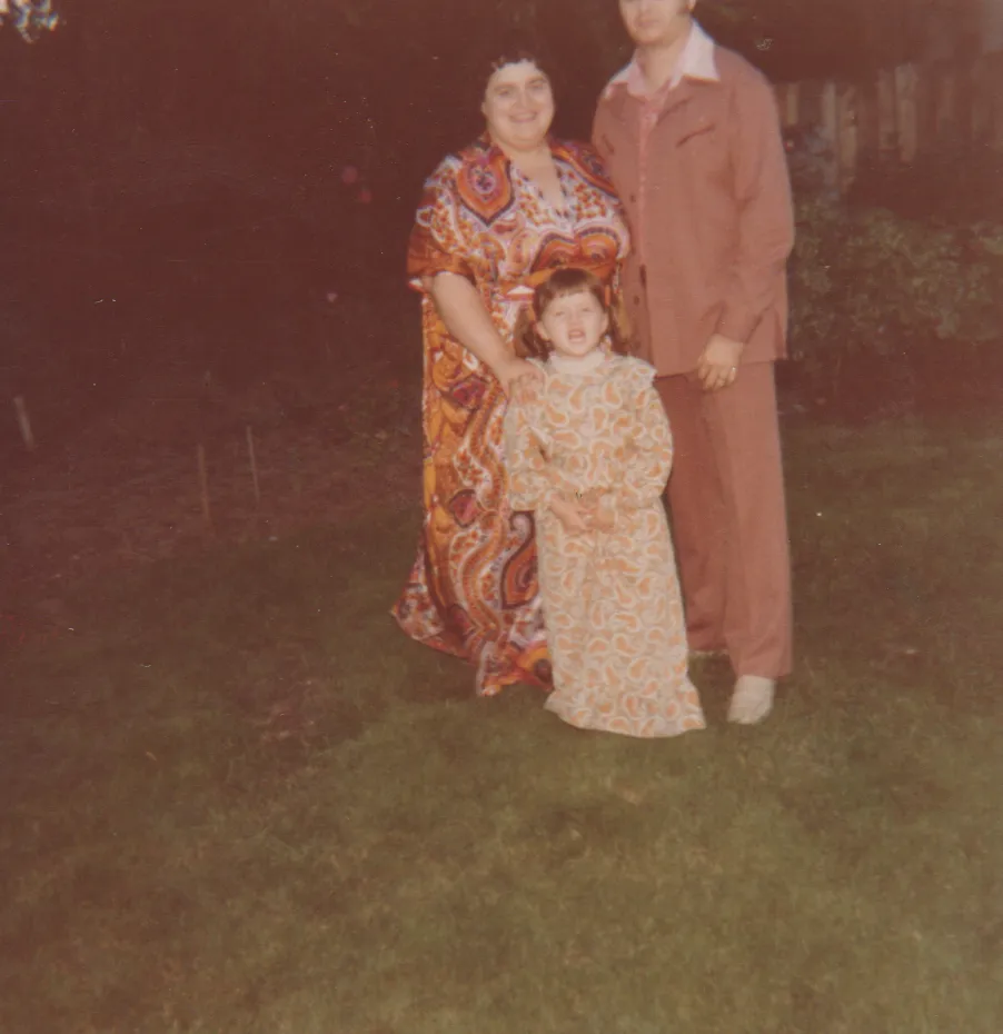 1978-09 - Family photo, woman, man, girl, grass, outside, photo was developed in September of that year, 1pic.png