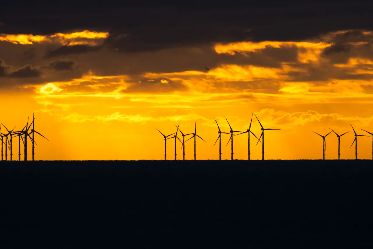 Shot of the Rampion Wind Farm at sunset