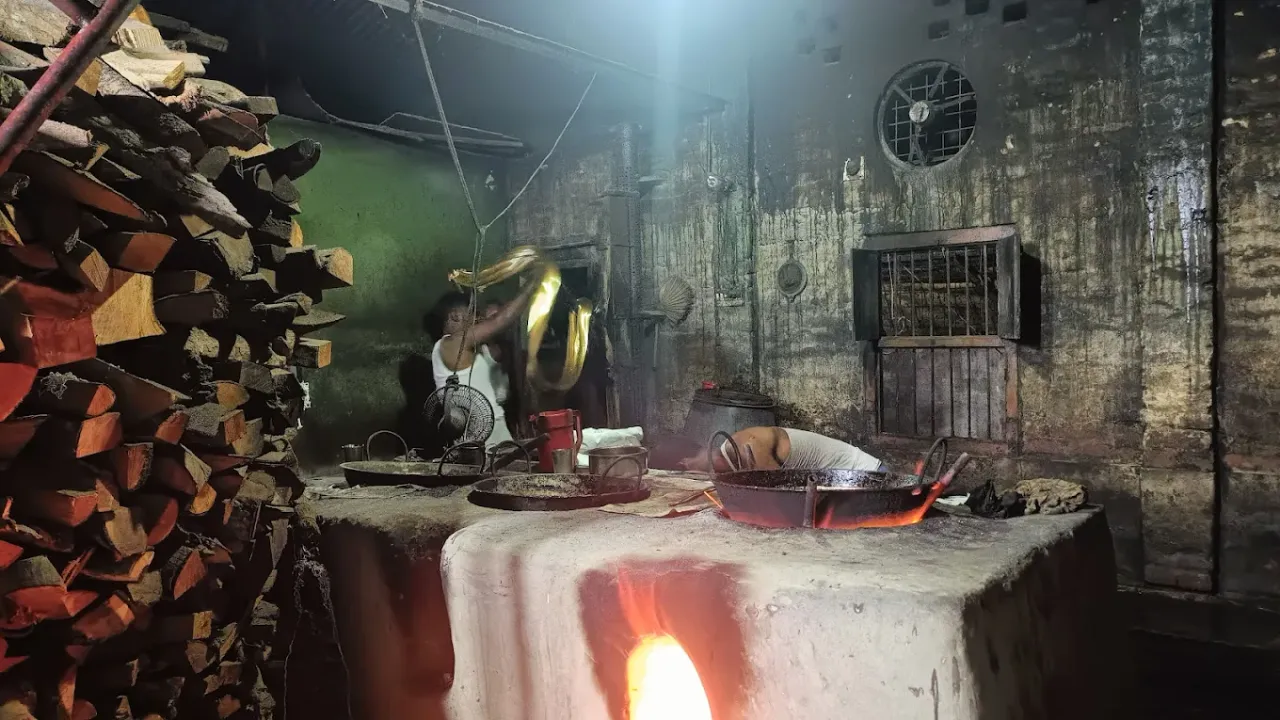 Sugar, water ,milk are being boiled.