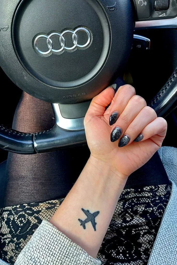 Travel tattoo idea airplane