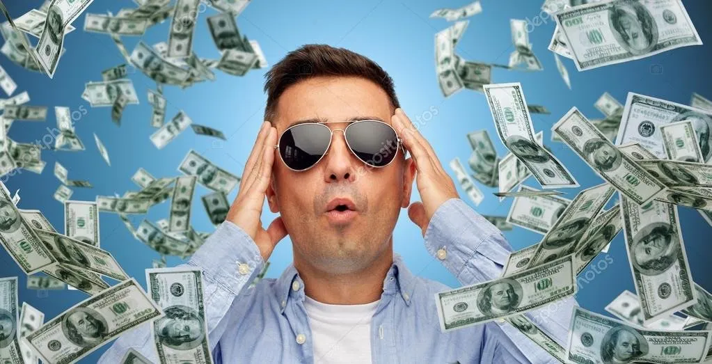 depositphotos_84481626-stock-photo-surprised-man-under-dollar-money.jpg