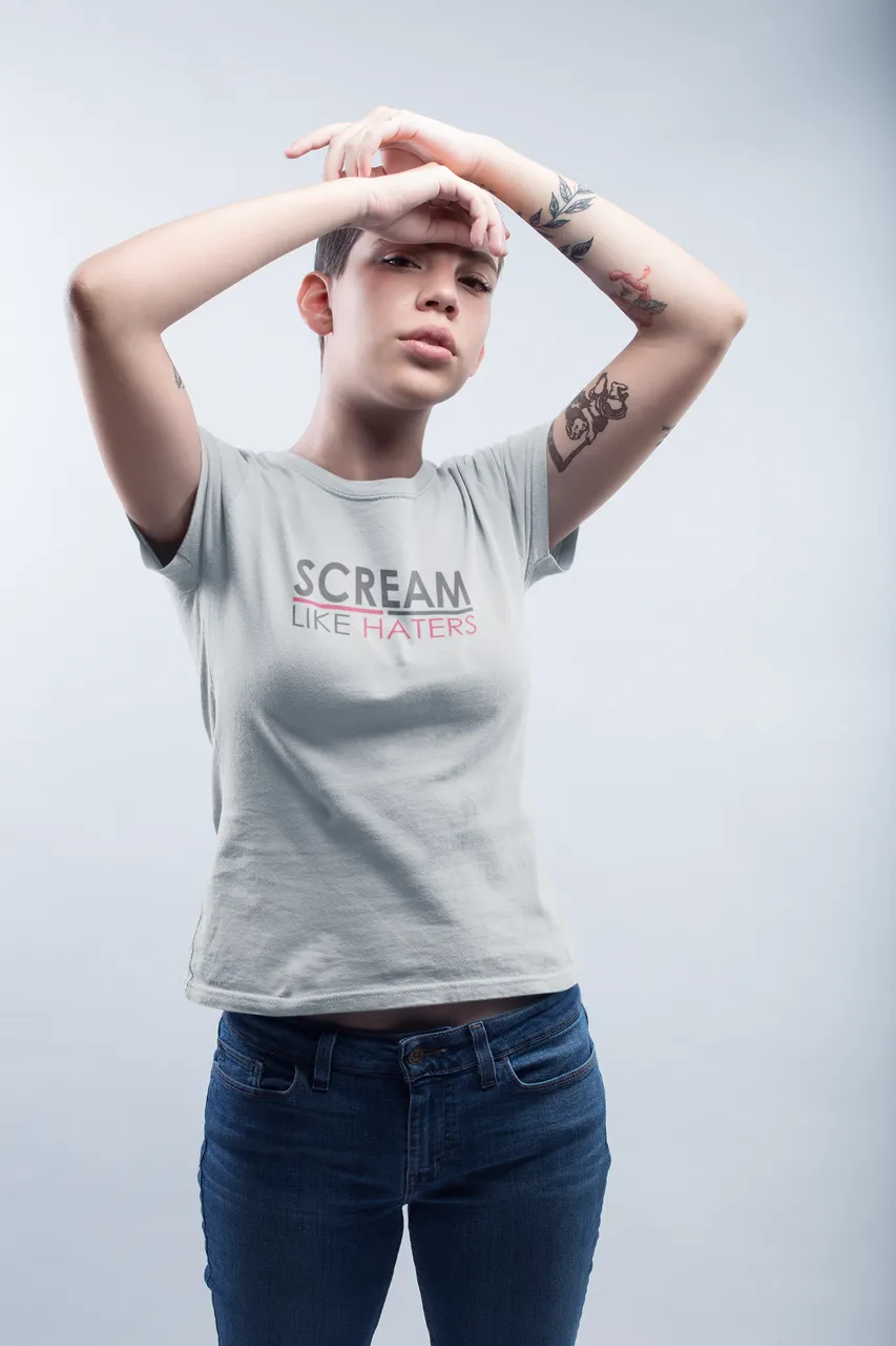 white-tattooed-girl-wearing-a-tshirt-mockup-against-a-white-wall-a19977.png