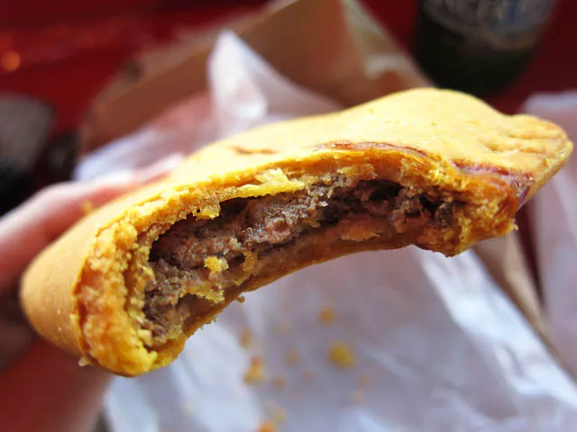 A delicious Jamaican patty. Photo by mesohungry