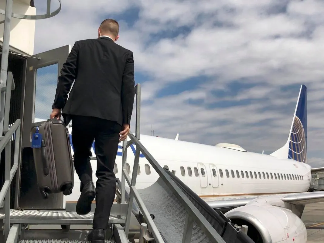 following the team leader up to the plane