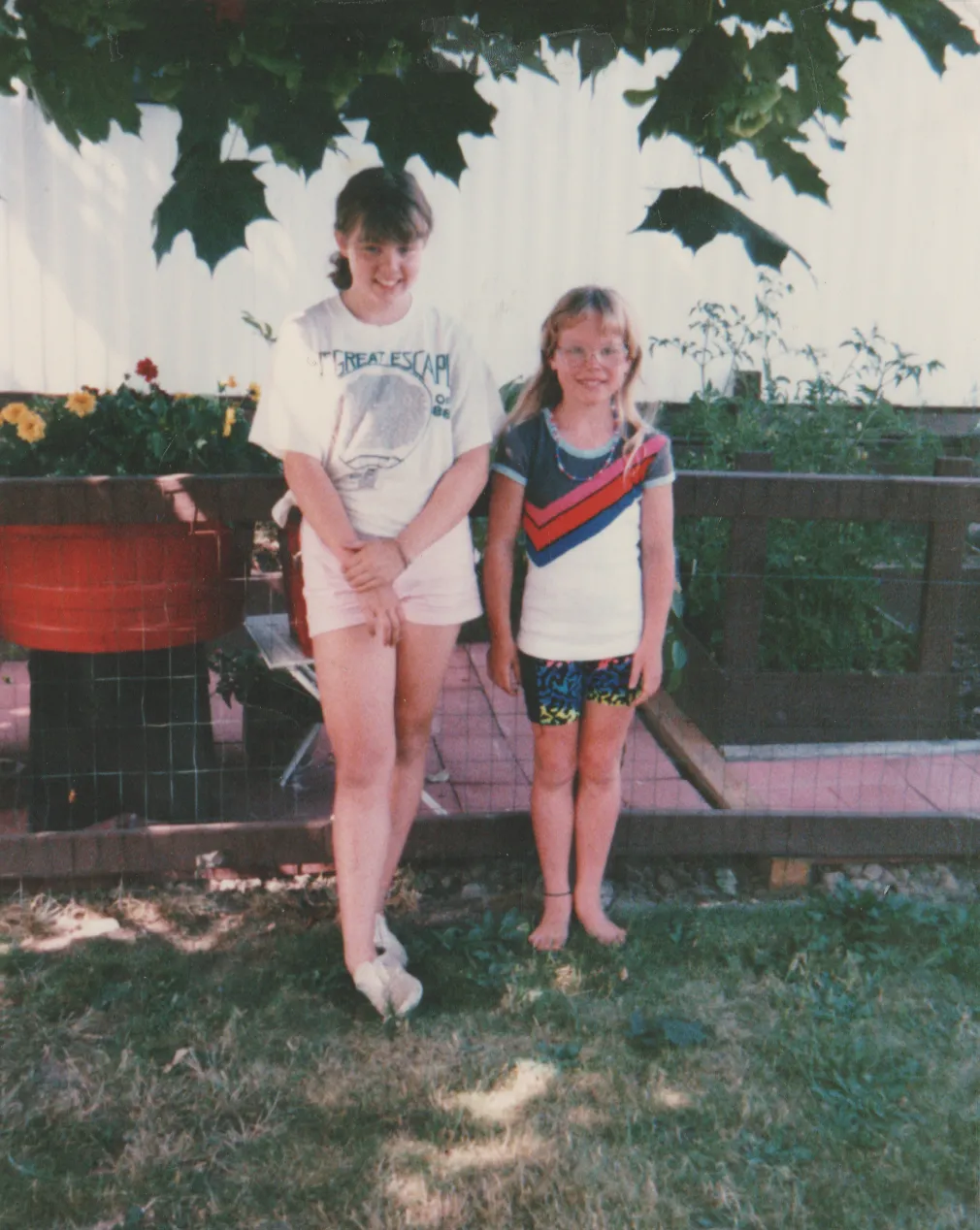 1989 Katie & Tall Girl FG House near Big Tree Front Yard.png