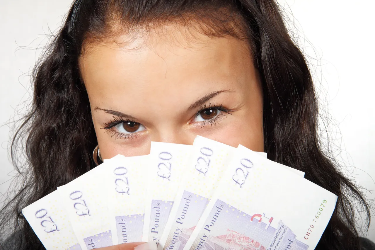 Why A Woman With A Gun Demands Her Money Back From The Bank.jpg