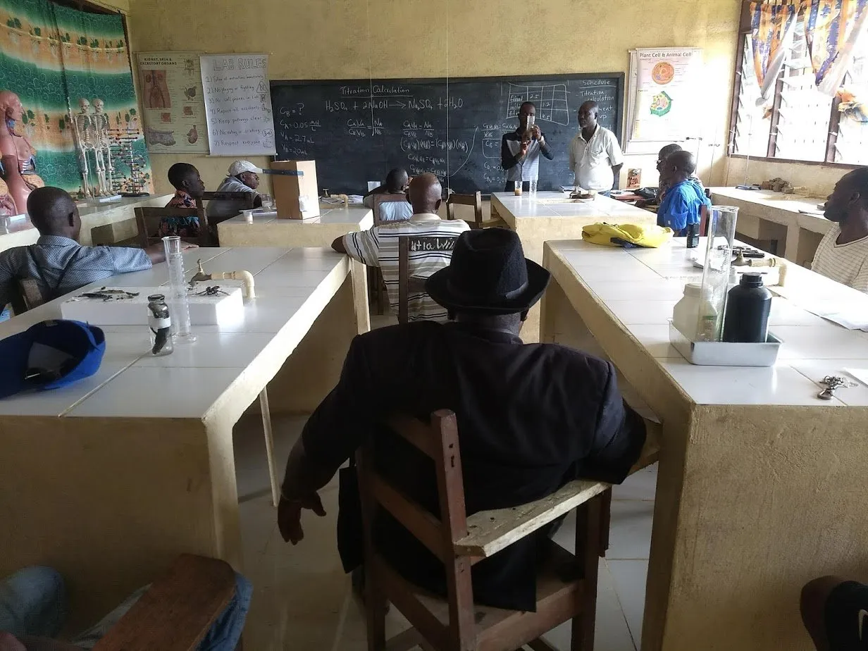 Trained Teachers presenting to special invitees. School Principal, Mr. Shariff, in Black garb