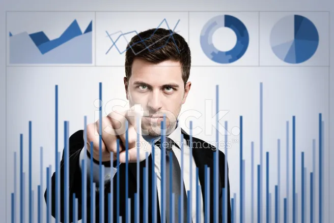 41624396-businessman-examining-charts.jpg