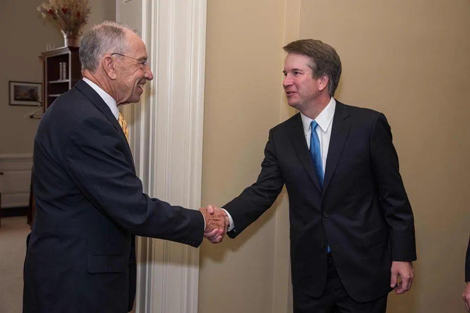 Chuck_Grassley_greets_Brett_Kavanaugh.jpg