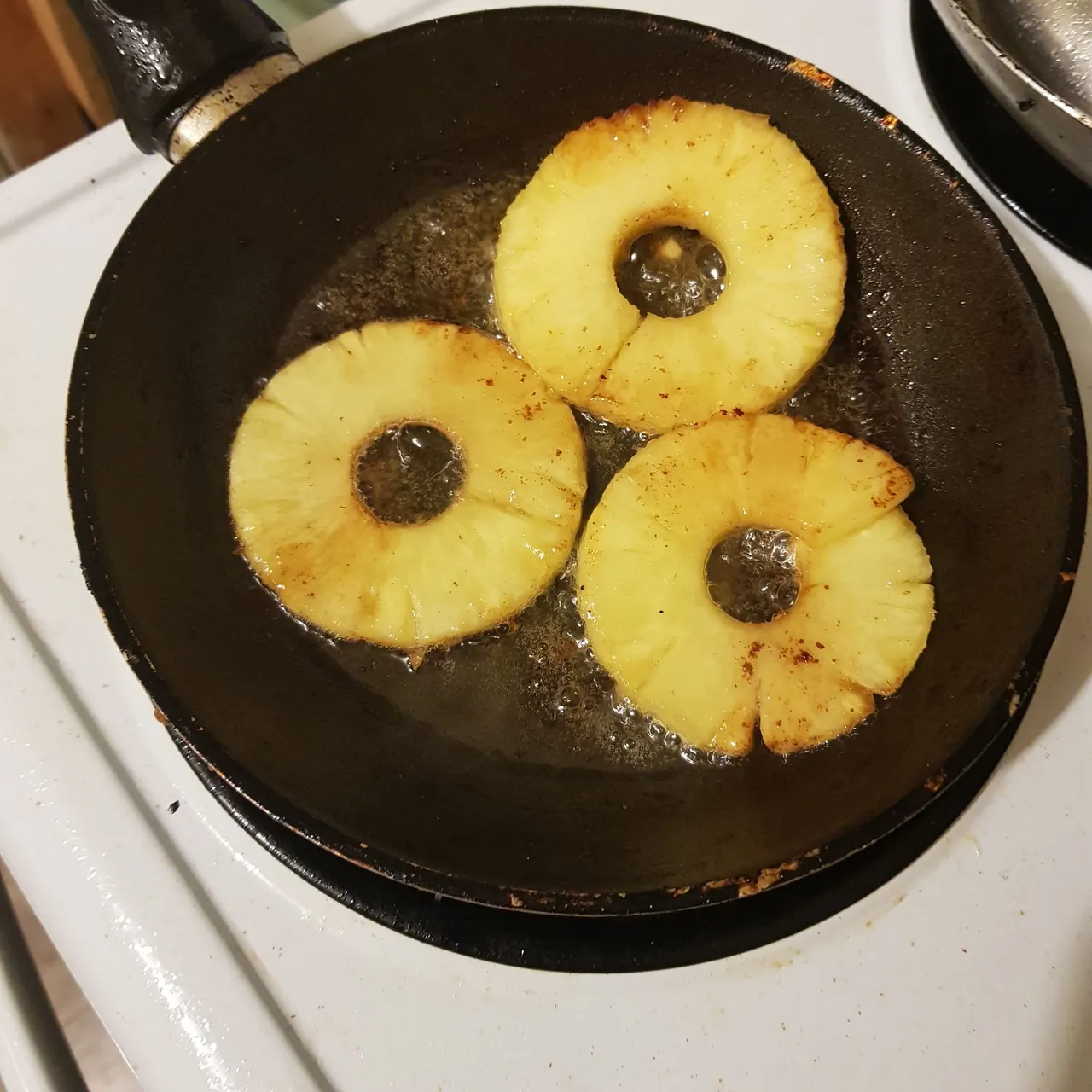 *Frying the pineapple*