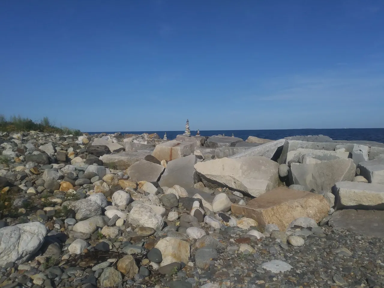 boulders on the shore and rock sculpture.jpg