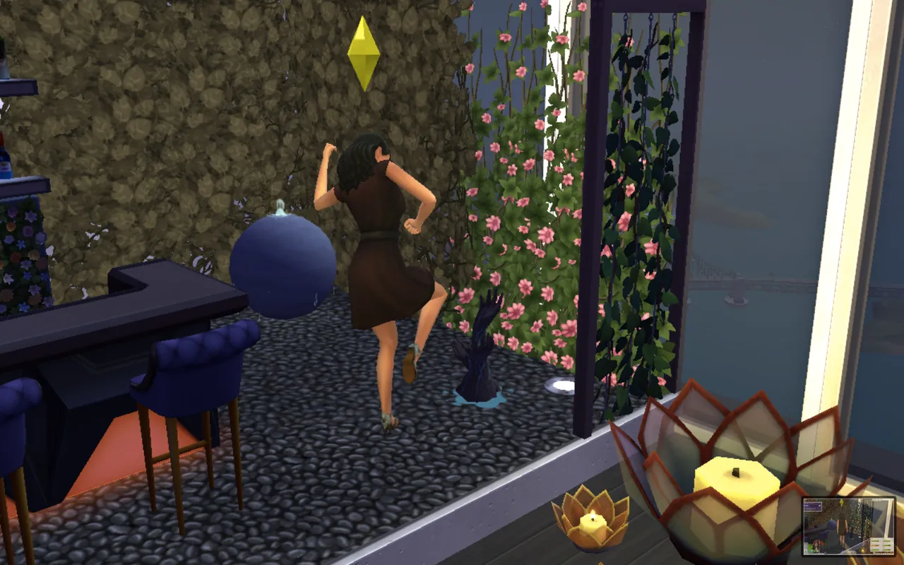 My sim at work, destroying some scary hands that all of a sudden showed up from the floor! Scary!