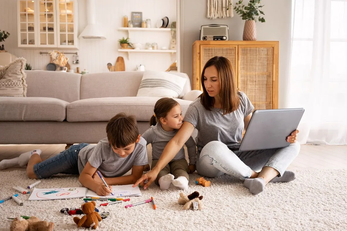 full-shot-woman-working-from-home-with-kids.jpg