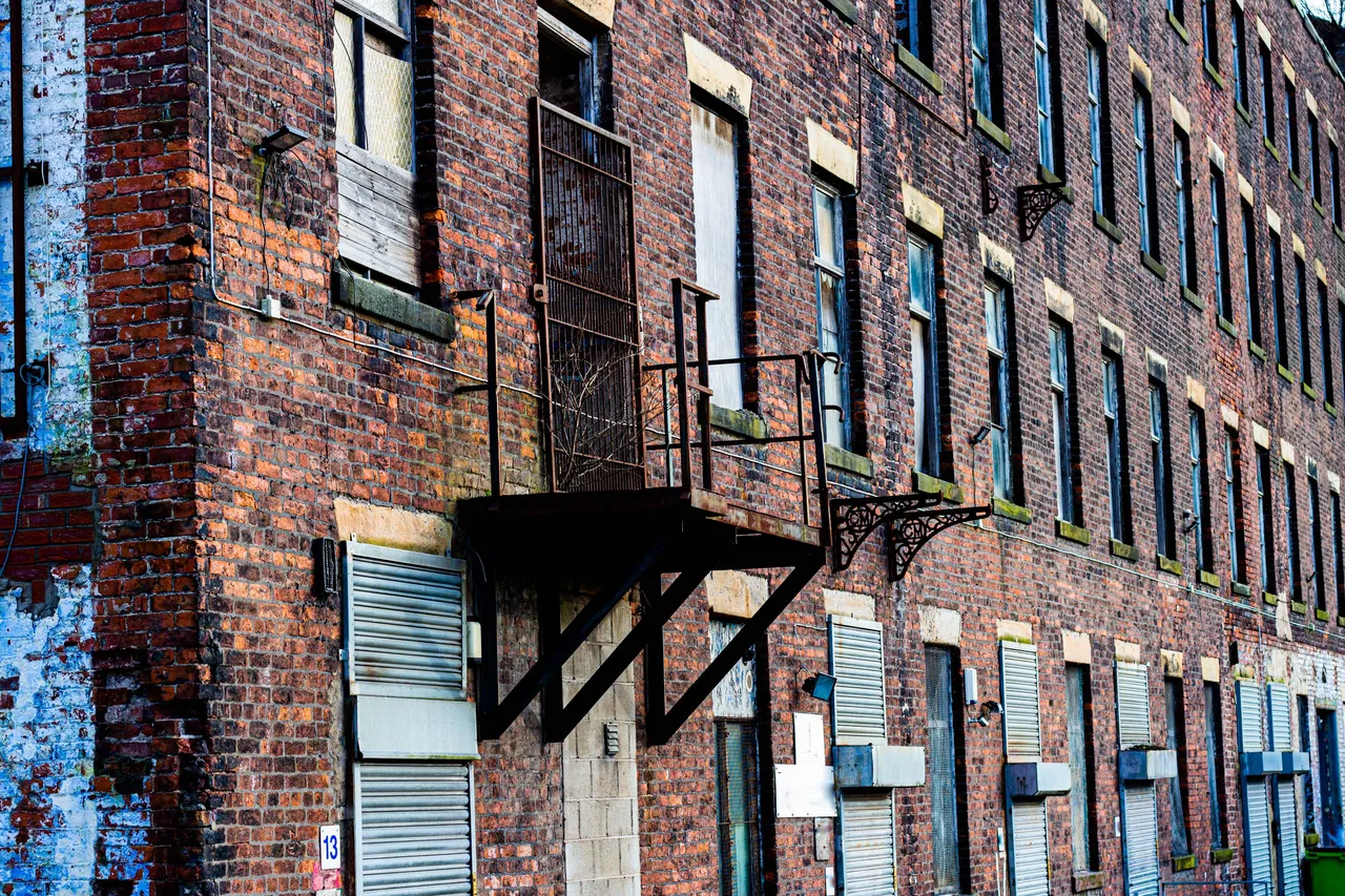 abandoned old factory next to the river in Heywood Greater Manchester.jpg