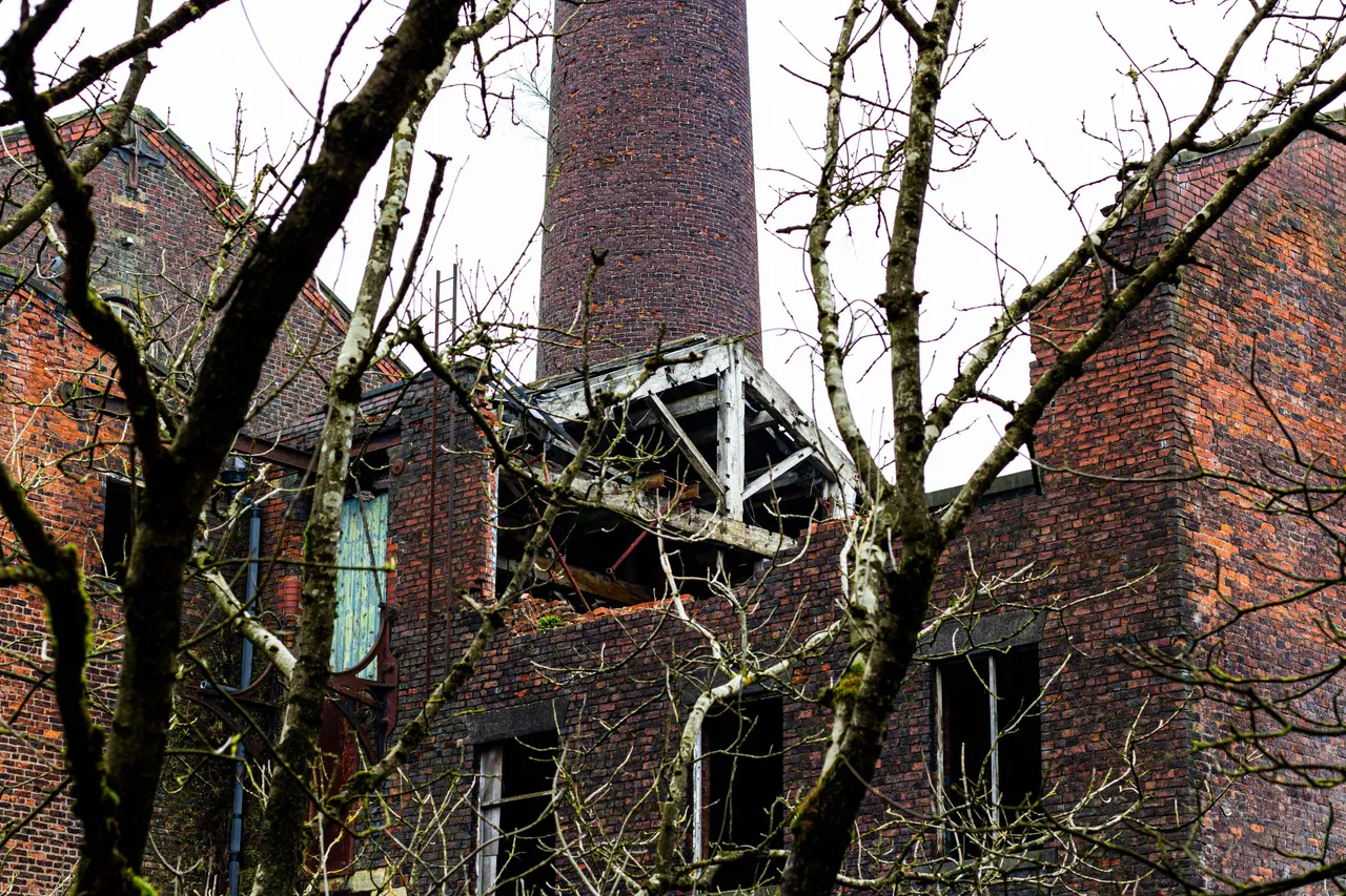 Ruined part of the old Crimble Mill factory outside the town of Heywood, Greater Manchester, England.jpg