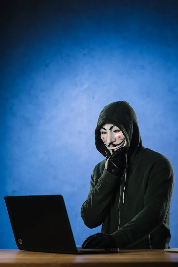 hacker-with-anonymous-mask_23-2147985395.jpg
