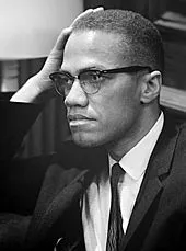 Malcolm_X_March_26_1964_cropped_retouched.jpg