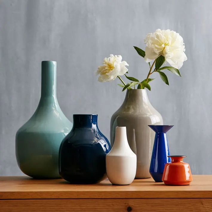 enamel-vases-blue-white-orange-gardenista.jpg