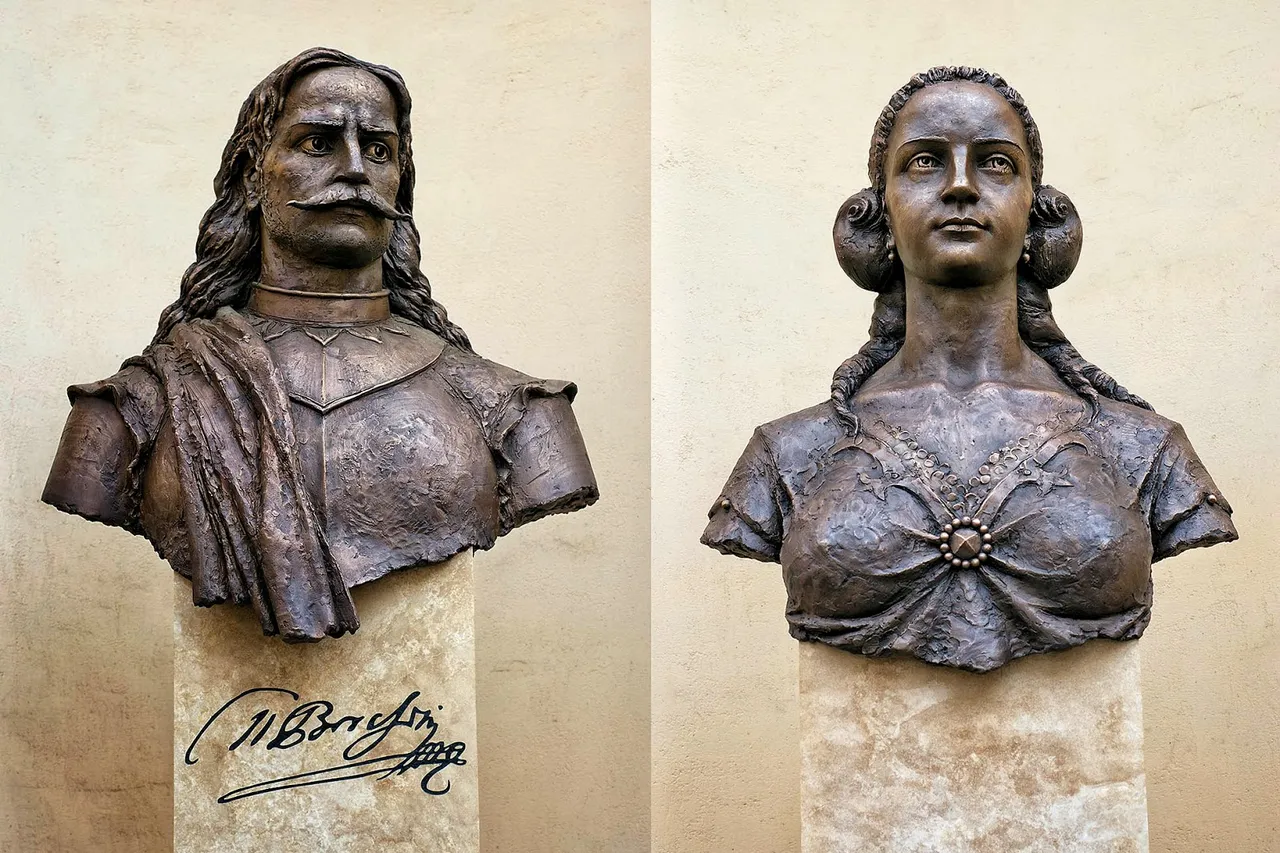 Christina Chuckie and Miklos Bercheni. Monuments in Uzhhorod Castle. Photo Source - Wikipedia