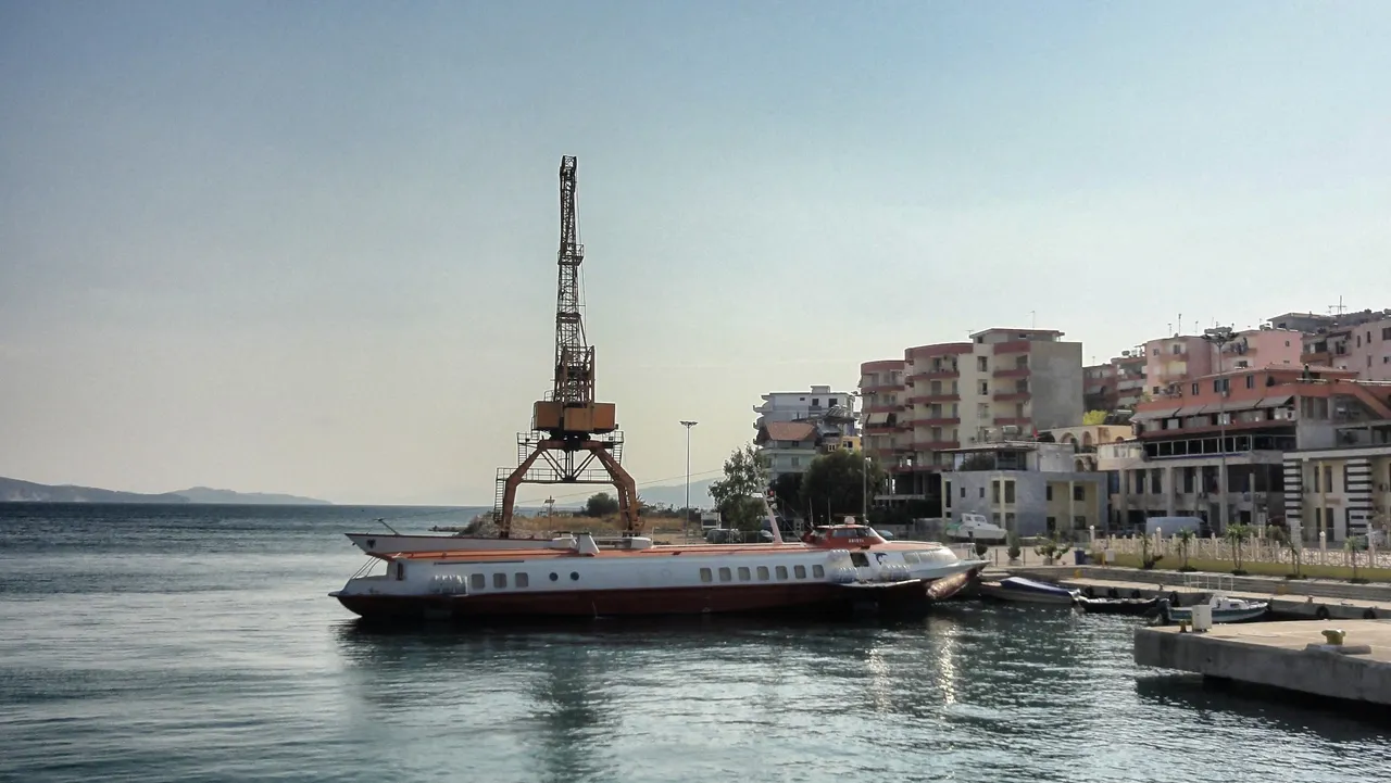 The small harbor, on the horizon is Corfu