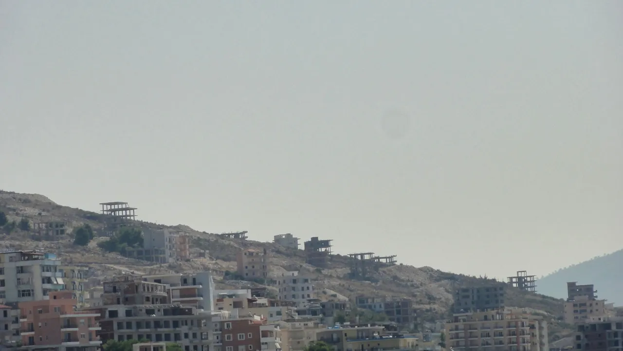 On the hill are many ruins from houses the government shots down before they are ready