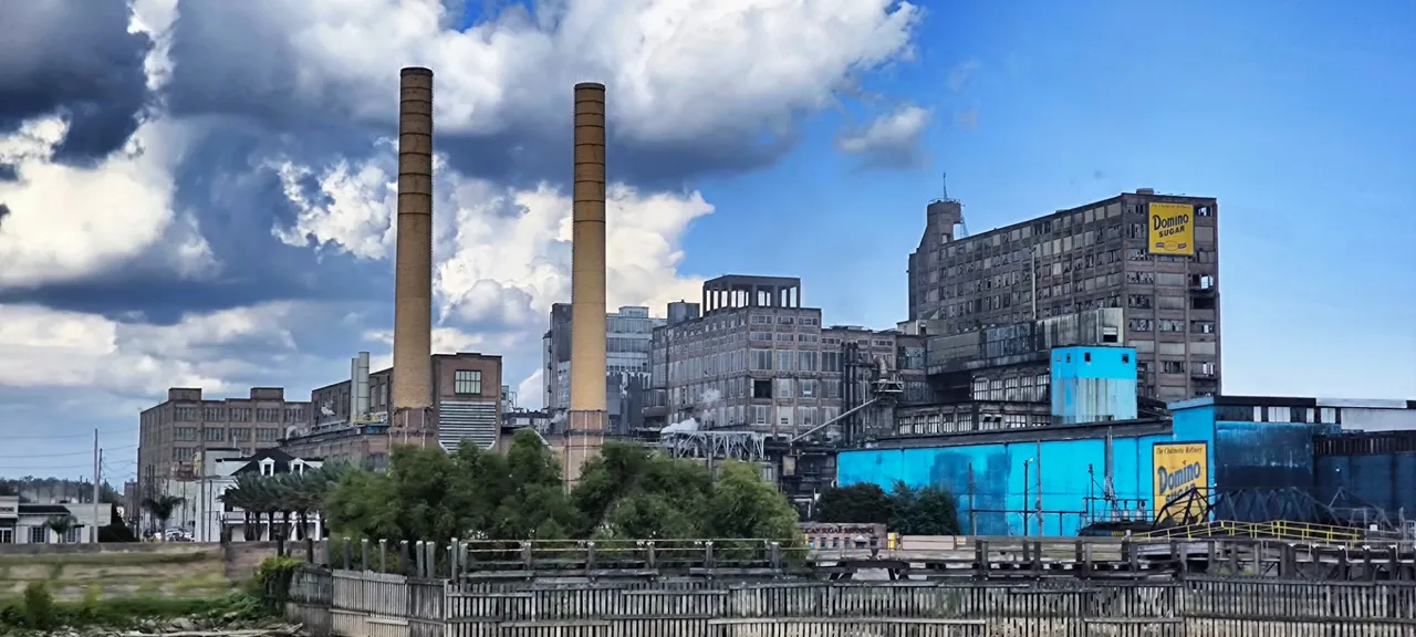 Near New Orleans, a blue island in red Louisiana, huge old plants are burning fossils