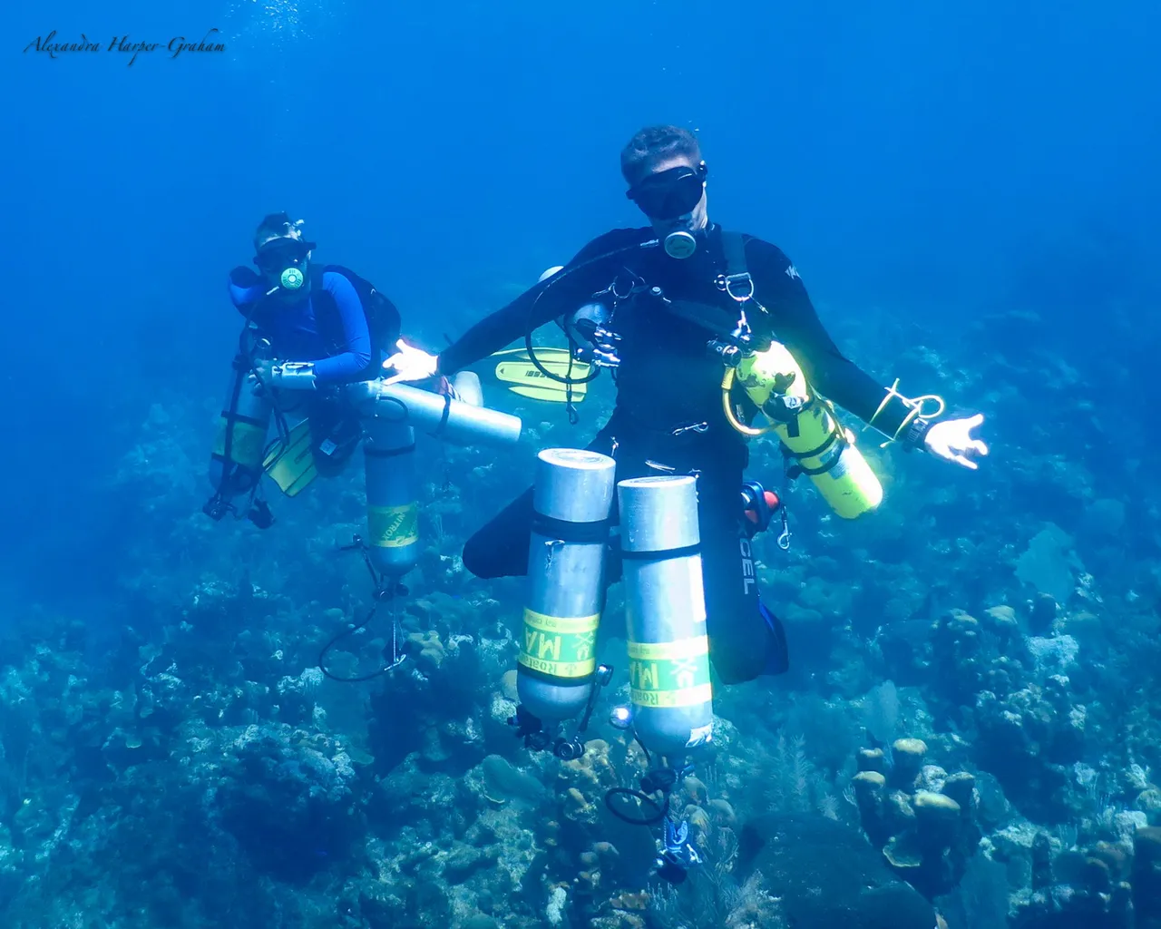 Disconnecting scuba gear after a tec dive in Roatan, Honduras