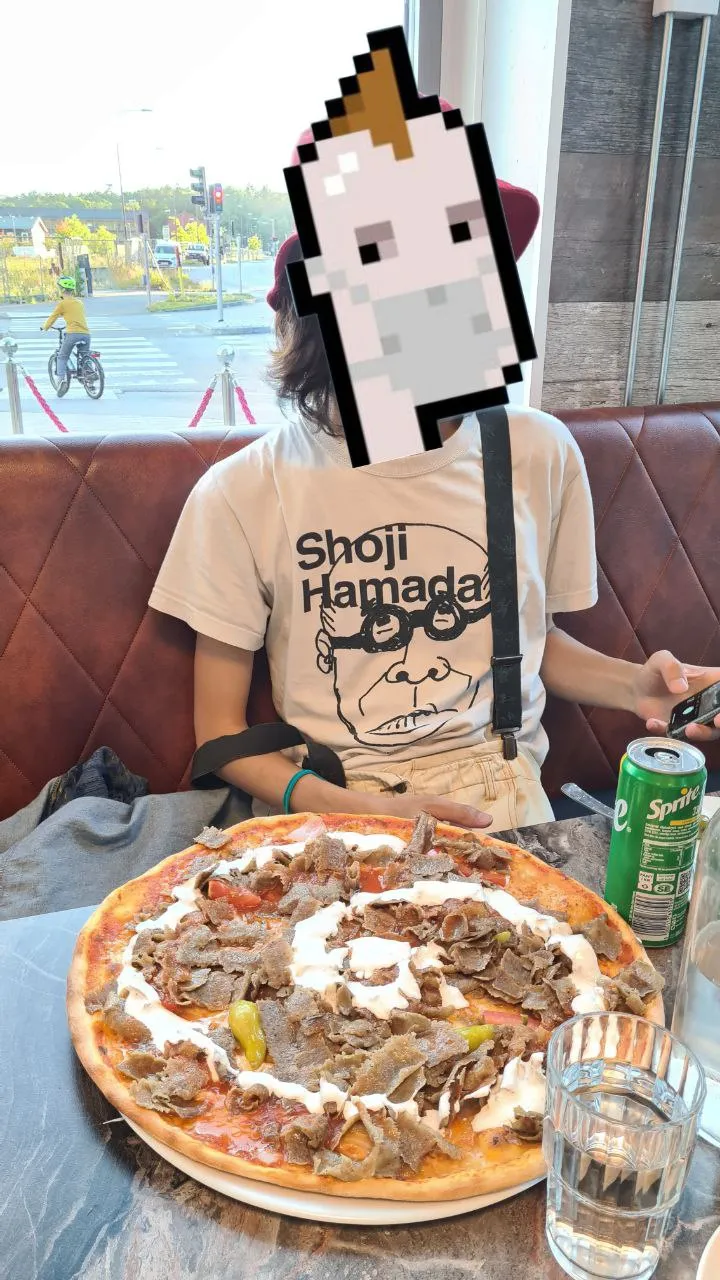 Swedish pizza bigger than my friend’s face.