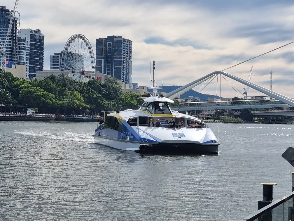 The ferry to take us back to our car and the Brisbane eye wheel at South Bank in the background.