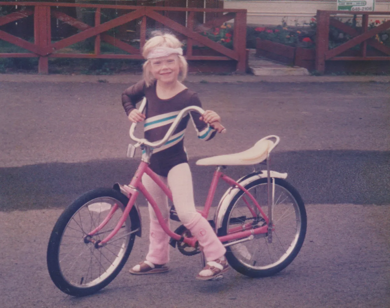 1985 maybe - Katie, pink bike, in front of 163.png