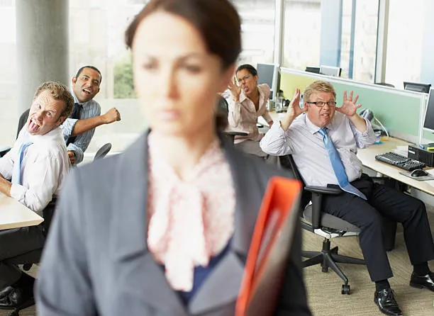 businesspeople-making-face-at-boss-in-office-picture-id85406805.jpg