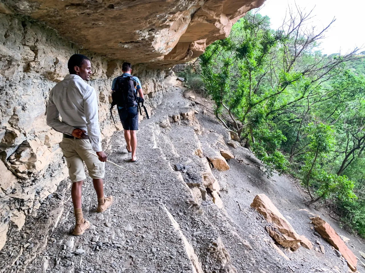 Walking out the cave, one last time to look out.