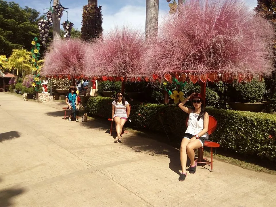 My mom (left), and two beautiful younger sisters, Kookee (middle), and Aira (right) posing at the Baker’s Hill Palawan.