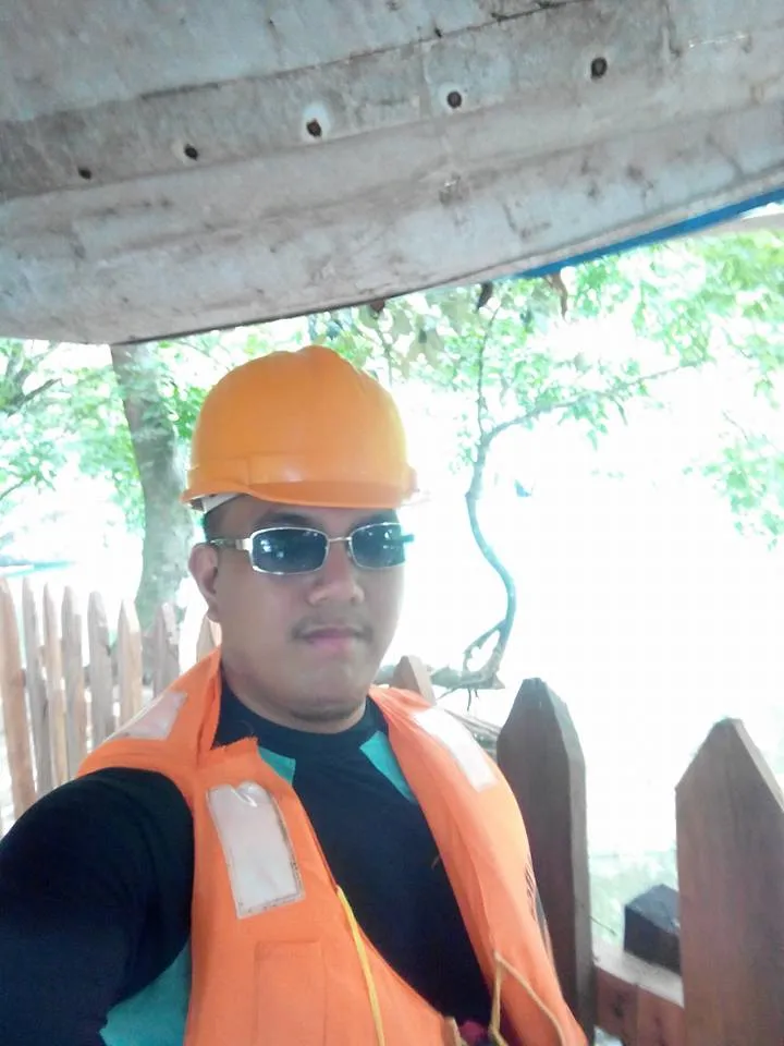 This is me wearing a life jacket and helmet (protection from bat urine)