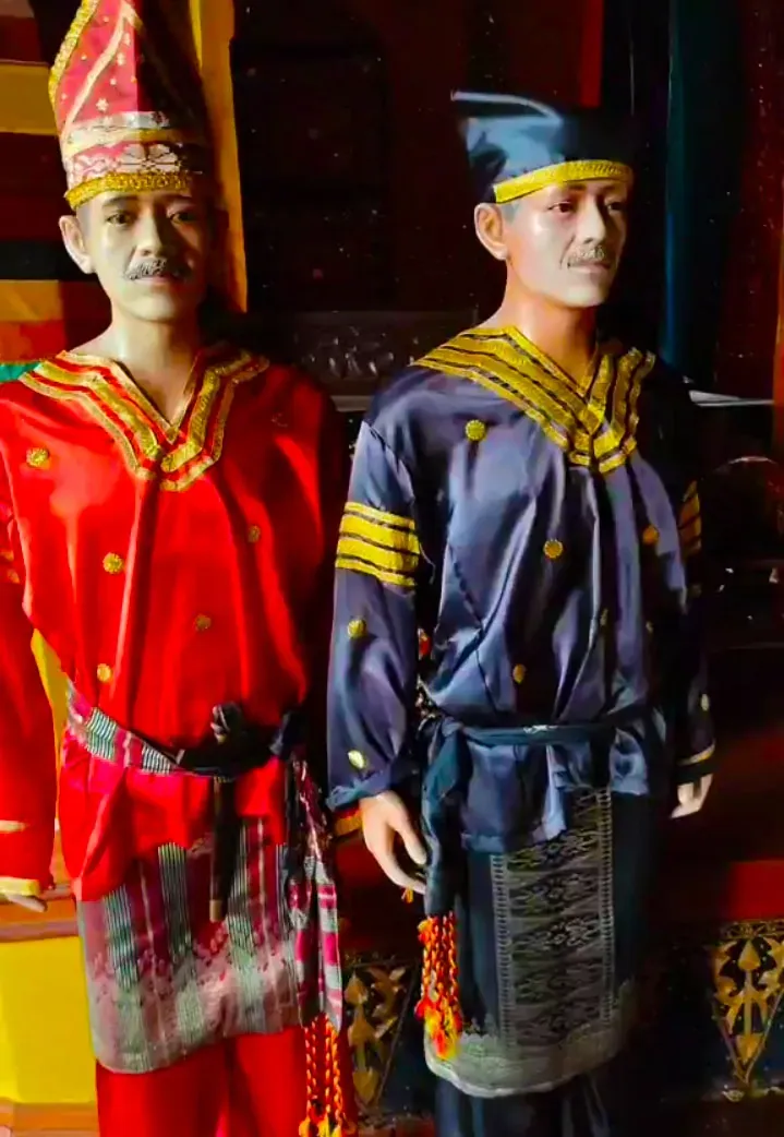 Statues And Customary Clothing