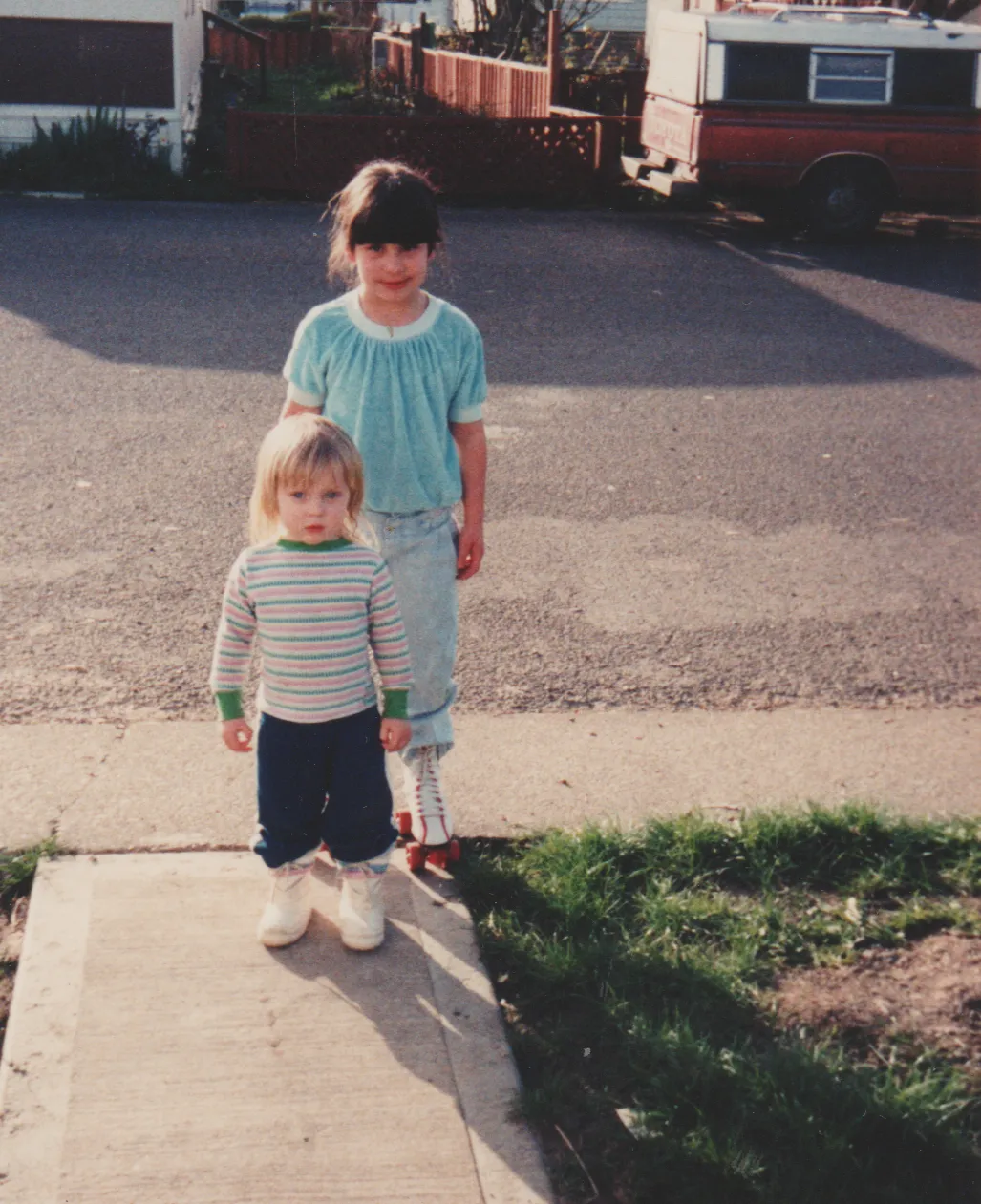 1992-04 - Crystal and her friend on the sidewalk, 163 front yard.png