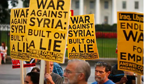 Syria-false-flag-chemical-attack-protest.jpg